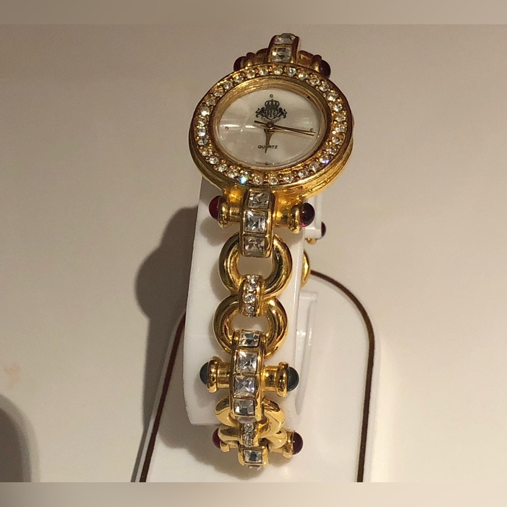 Gold tone and rhinestones watch